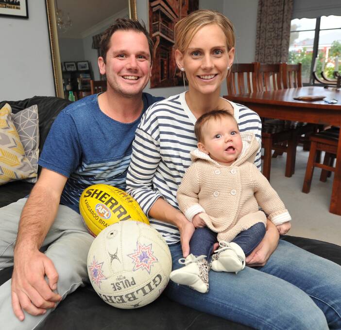 IN THE FAMILY: Jayden, Katie and three-month-old Mia Kotzur at home in Wagga on Wednesday. Picture: Laura Hardwick