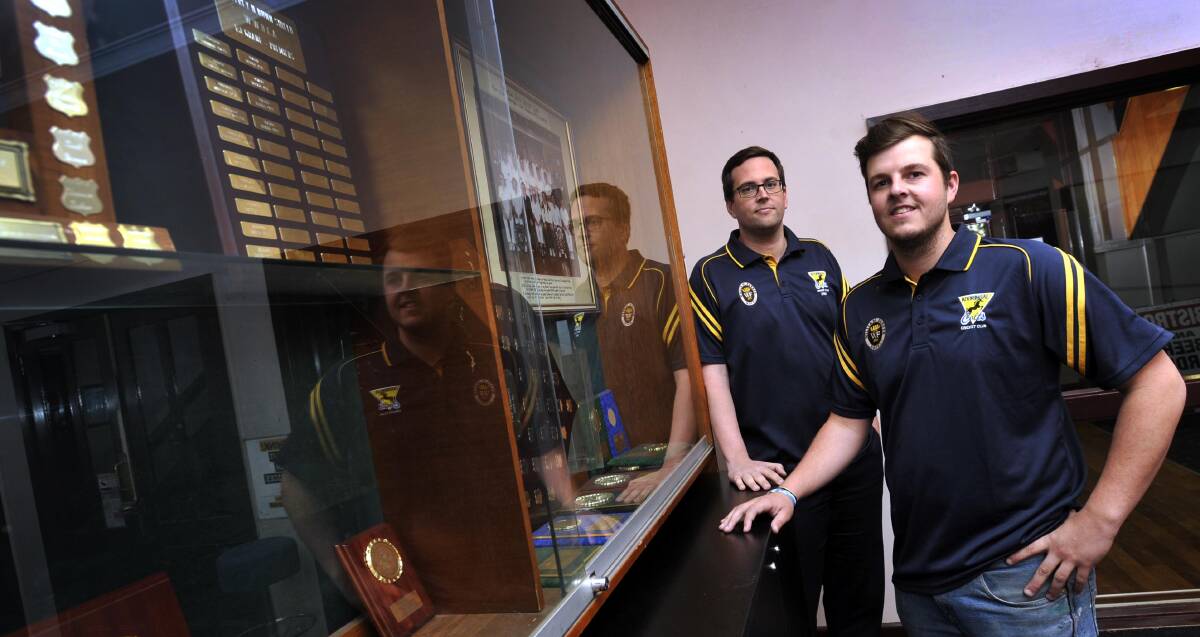 PROUD HISTORY: Newly-appointed Kooringal Colts co-coaches David Bolton (left) and Andrew Dutton look at the club's trophy cabinet at the William Farrer Hotel. Picture: Les Smith