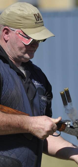 RELOAD: Horsham's Craig Kelly takes part in a handicap event at the state trap titles on Saturday. Pictures: Les Smith