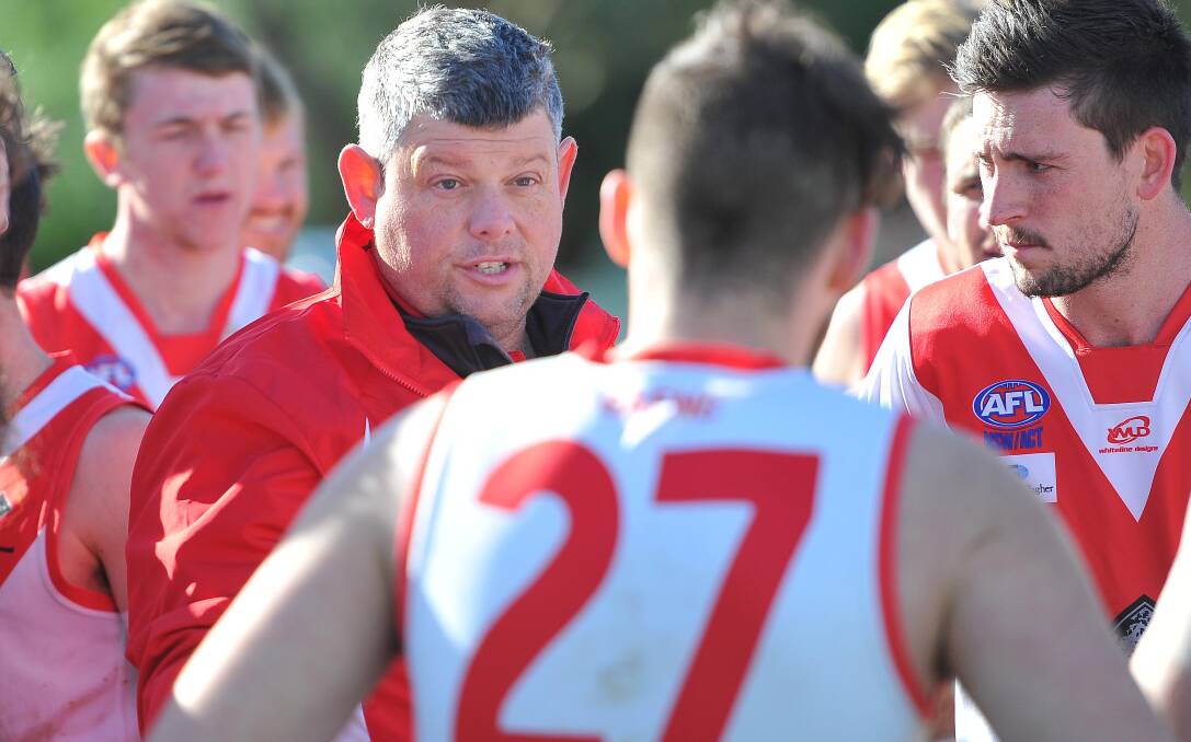 KEEPING THE FAITH: Griffith director of coaching Adrian Pavese has a stern talk to his players in last week's loss to Collingullie. Picture: Kieren L Tilly
