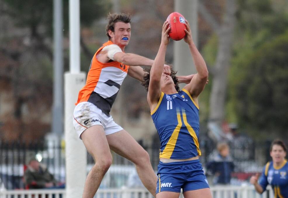 COP THAT: Temora's Jacob Turner marks in front of GWS' Kieren Briggs in the NEAFL game at Robertson Oval on Saturday. Picture: Laura Hardwick