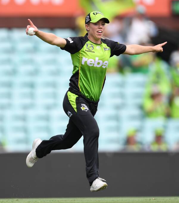 ON A ROLL: Sydney Thunder's Naomi Stalenberg celebrates catching Ashleigh Gardner in the Women's Big Bash League (WBBL) win over the Sydney Sixers at the SCG on Saturday. 