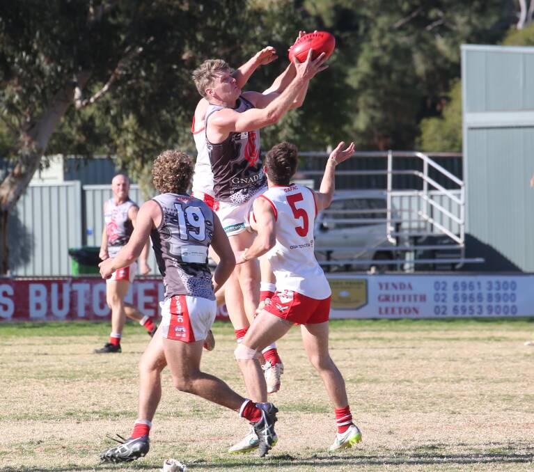 STRONG: Collingullie coach Luke Gestier takes a pack mark in the win over Griffith at Exies Oval on Saturday. Picture: Anthony Stipo
