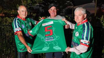 Lonnie Hampton, Chris Suckling and Mick Graham show off the Brothers' 1984 premiership reunion jumpers that will be worn as part of the Riverina Bluebell Cup against Young on Saturday. Picture by Les Smith