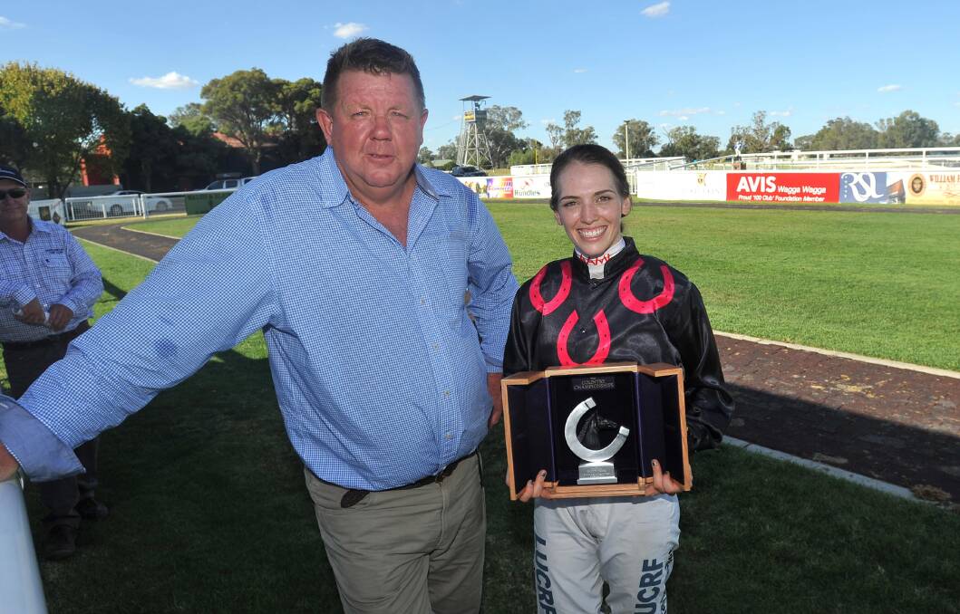 ON TOP: Albury horseman Brett Cavanough, pictured with Kayla Nisbet, leads the Southern District trainer's premiership.