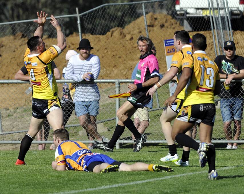 DAY OUT: Gundagai centre Damian Willis does some of his best work during the 2015 grand final. Picture: Les Smith