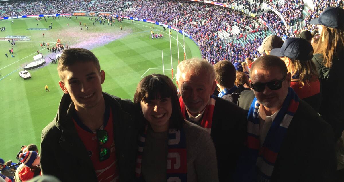MAGIC MOMENT: Blake, Siobhan, Graham and Trevor Ion at the Melbourne Cricket Ground (MCG) last Saturday, watching Western Bulldogs' drought-breaking AFL premiership win.