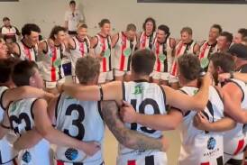 North Wagga belt out their team song at Coleambally Sportsground on Saturday. Picture by North Wagga AFNC