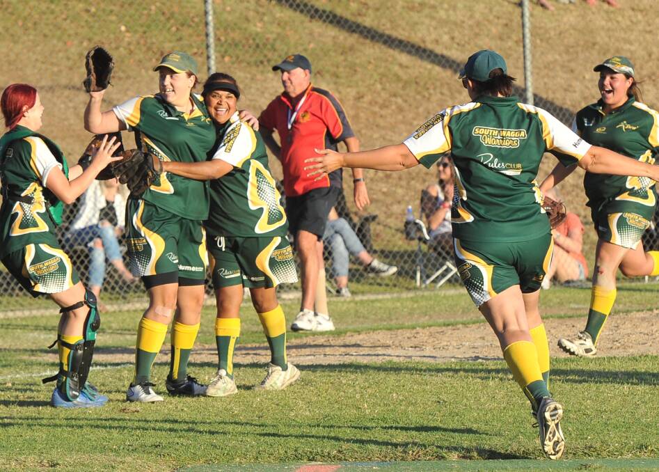 MOMENT OF GLORY: South Wagga Warriors players go wild as they celebrate their grand final win on Saturday. Picture: Laura Hardwick
