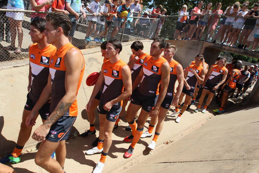 NOT HAPPENING: Greater Western Sydney (GWS) run out onto Narrandera Sportsground in the pre-season game against West Coast in February. Picture: Les Smith