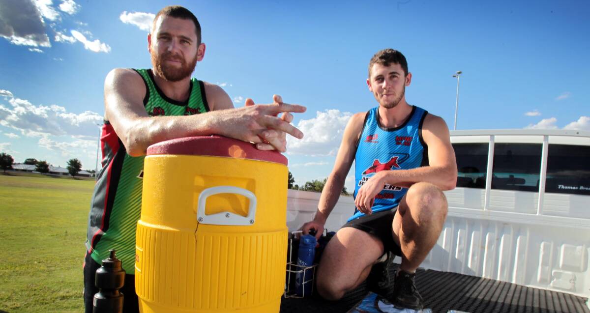FAMILY AFFAIR: Marrar coach Matt Molkentin (left) and brother Nick at the Bombers pre-season training run on Tuesday night. Picture: Les Smith