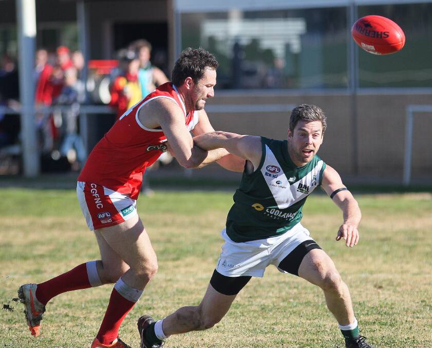 CONTEST: Collingullie's Marc Geppert and Coolamon's Ryan Chamberlain grapple at Crossroads Oval on Saturday. Picture: Kieren L Tilly
