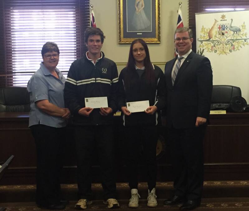 RECOGNISED: Temora District Sports Council secretary Judy Gilchrist (left) and president Rick Firman OAM (right) present Lachlan Leary and Layla Lynch with their elite sportsman grants at Temora Shire Council Chambers.