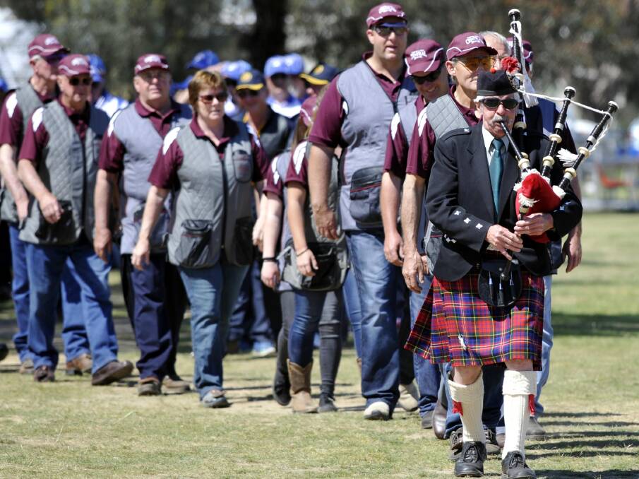 FESTIVITIES: Wagga piper Bob Sott takes part in the opening ceremony of the state trap titles at Wagga's National Shooting Grounds.