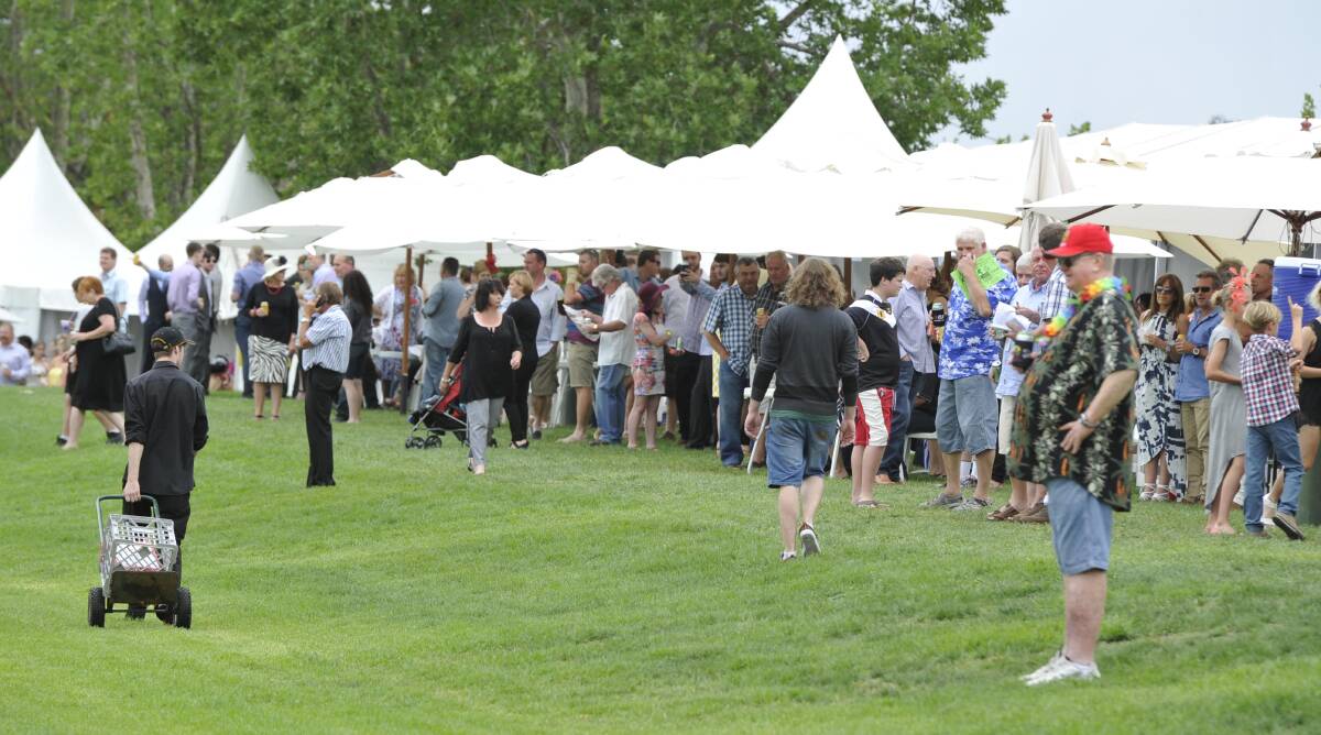POPULAR: A big crowd turned out for the 2014 Christmas Party race day. Picture: Les Smith