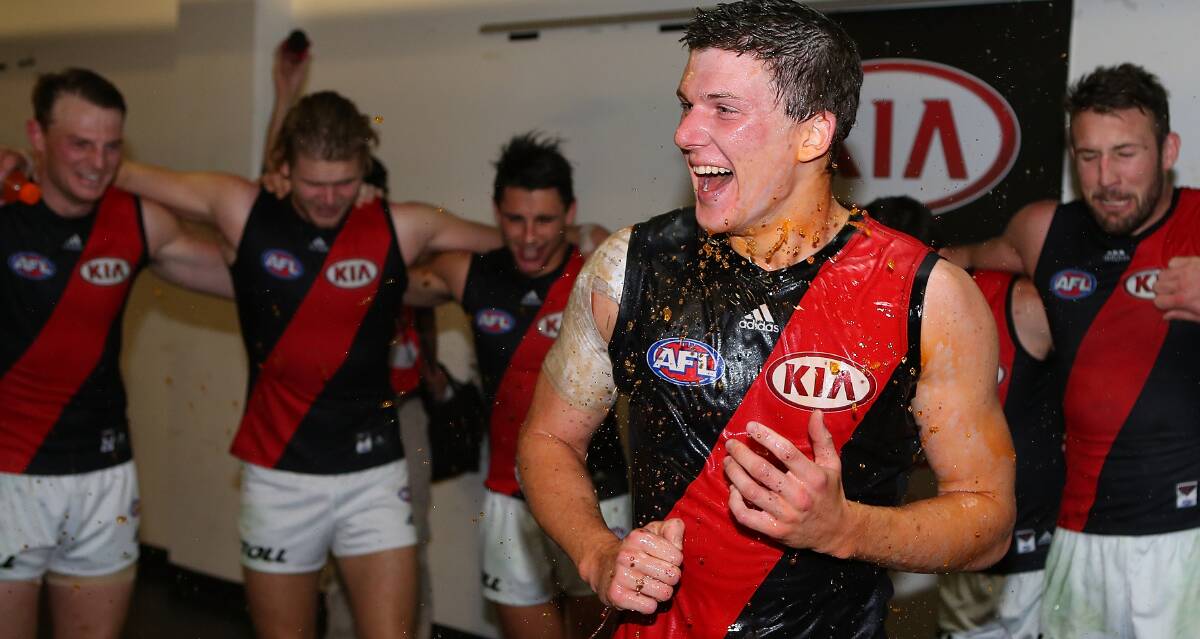 HAPPIER DAYS: Leeton footballer Kurt Aylett enjoys his first AFL win with Essendon during the 2014 season. Picture: Getty Images
