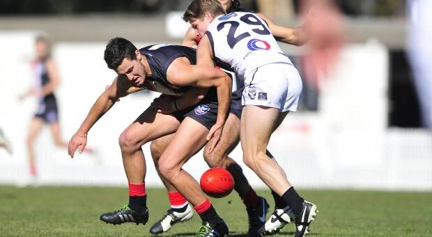 GRIFFITH BOUND: Jordan Iudica (left) in action for Ainslie during a North Eastern Australian Football League game this year. Picture: Canberra Times