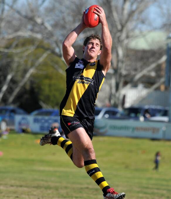 STAYING POSITIVE: Wagga Tigers captain-coach Matt Rava takes a mark during the second semi-final at Narrandera Sportsground. Picture: Laura Hardwick