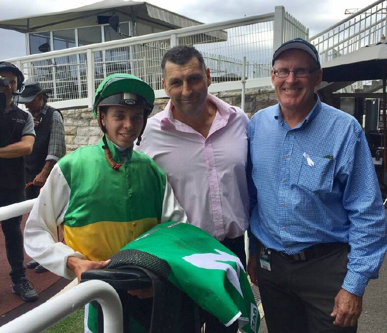 HAPPY DAYS: Apprentice jockey Andrew Adkins, trainer Rick Worthington and owner Greg Carroll after Grand Allowance's win on Wednesday. Picture: Rick Worthington