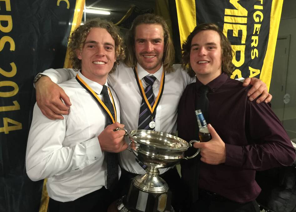 WINNER: Wagga Tigers best and fairest winner Brendan Myers, captain-coach Shaun Campbell and Lachlan Myers at the club's presentation night.