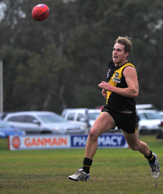 BACK ON BOARD: Jim Carroll chases the ball during the 2013 season at Ganmain Sportsground. Carroll has returned to Wagga Tigers this year. 
