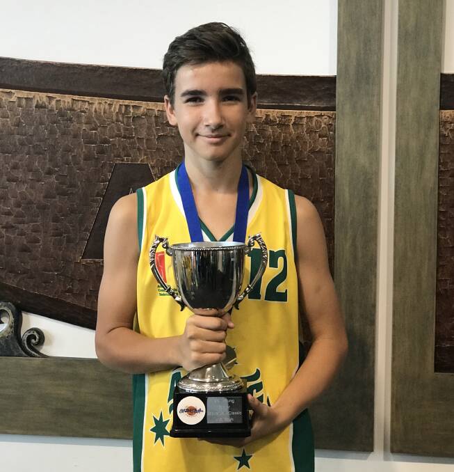 RISING STAR: Wagga teenager Josh Cochrane shows off his spoils from a successful trip to New Zealand. Cochrane was part of the Australian Country team that won the under 15 Mel Young Easter Classic.