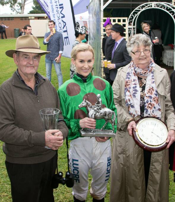 DEARLY MISSED: Nerrida Clancy (right) at Leeton races with husband Peter and one of their apprentice jockeys, Kristen Smart. 