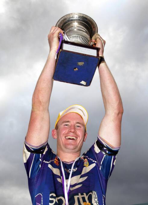 Nick Skinner lifts the Group Nine trophy aloft last year. Picture: Les Smith