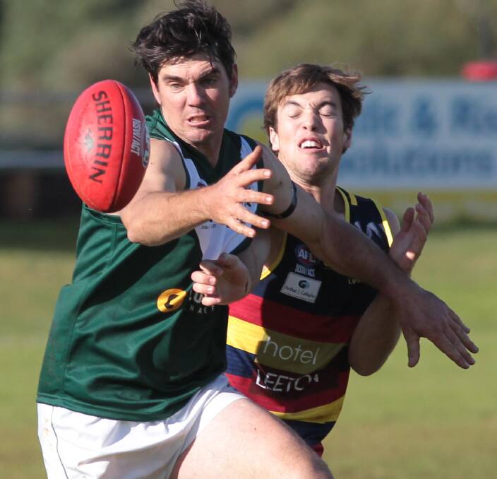 GET HERE: Coolamon big man Ben Edyvean contests for the ball with Leeton-Whitton defender Will Wakeman at Kindra Park on Saturday. Picture: Les Smith