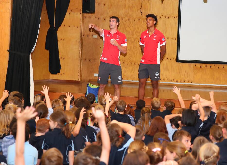 A HIT: Dean Towers and Joel Amartey at Wagga Public School on Tuesday. Picture: Kieren L Tilly