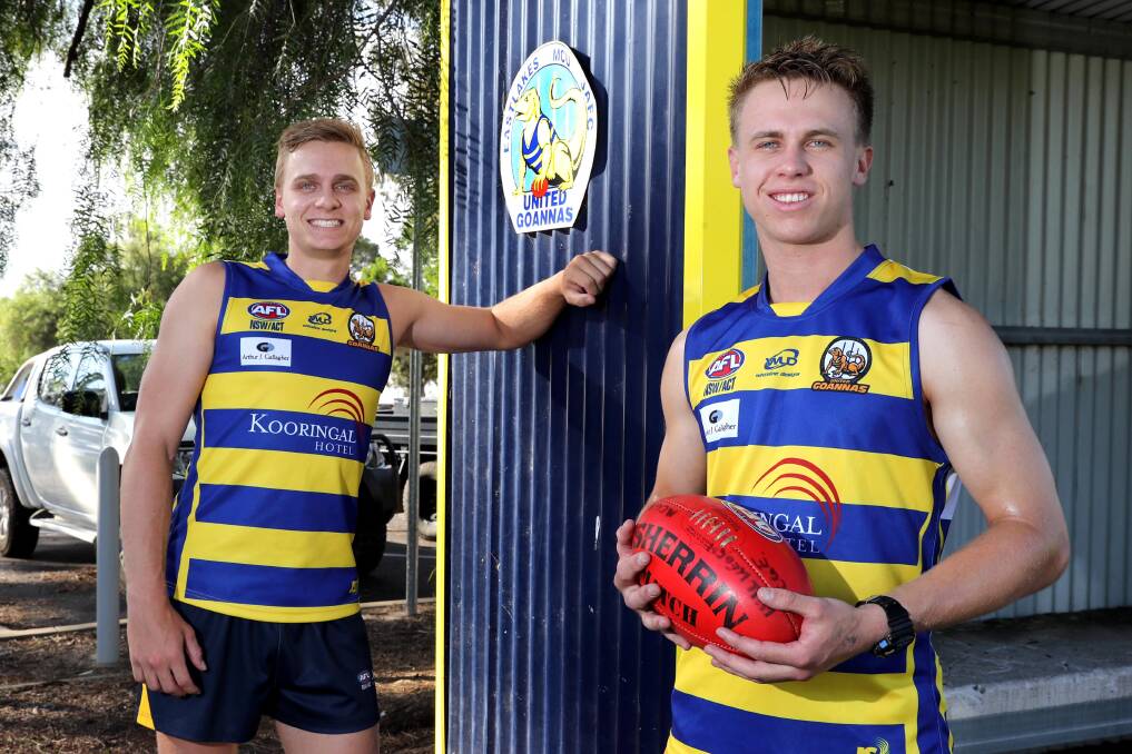 FAMILY AFFAIR: Alex McCormack (left) welcomes younger brother Nick to Mangoplah-Cookardinia United-Eastlakes on Thursday. Picture: Les Smith