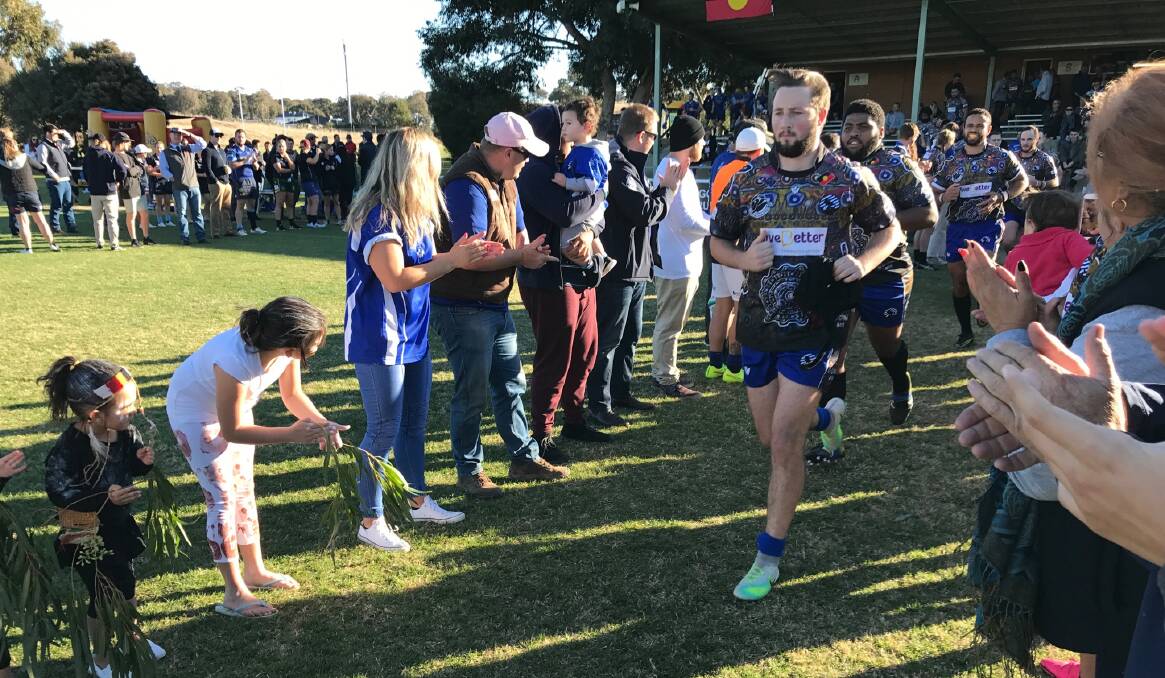 TOP EVENT: Drew Martin runs out for Wagga City in their special jumper as part of the club's inaugural indigenous round against Waratahs. 