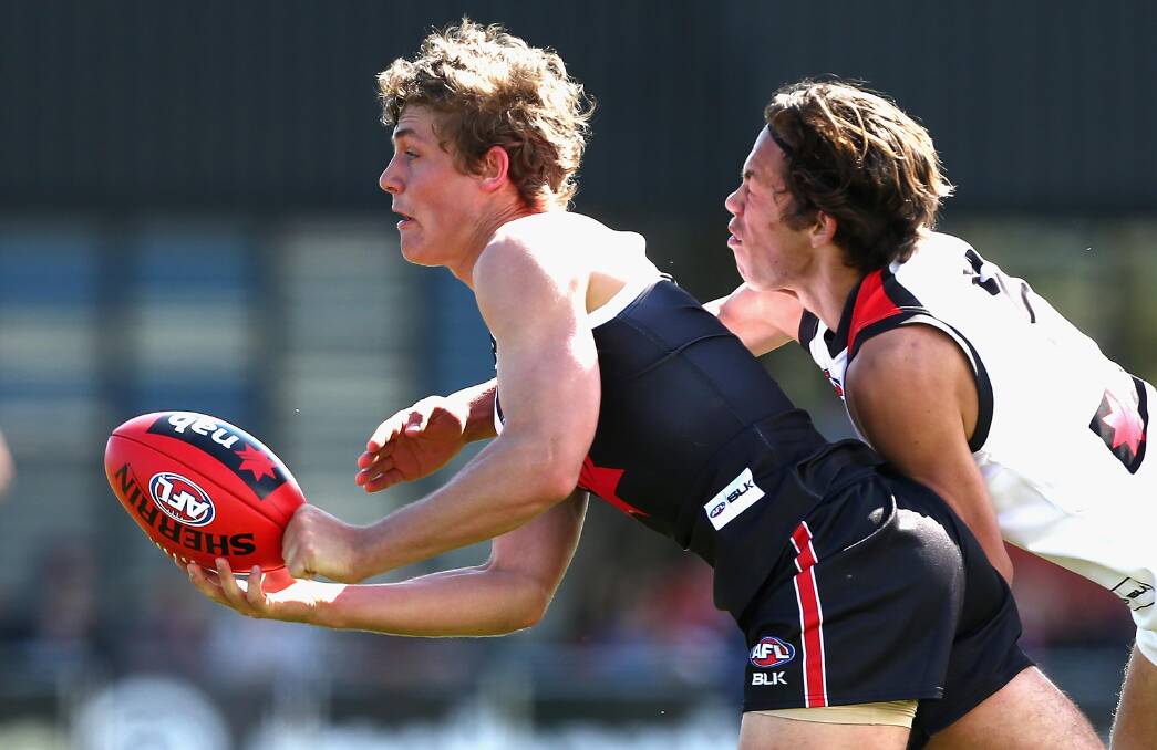 CLASS: Collingullie teen Harry Perryman dishes off a handball during the NAB AFL All Stars Match at Punt Road last Friday. Picture: AFL Media