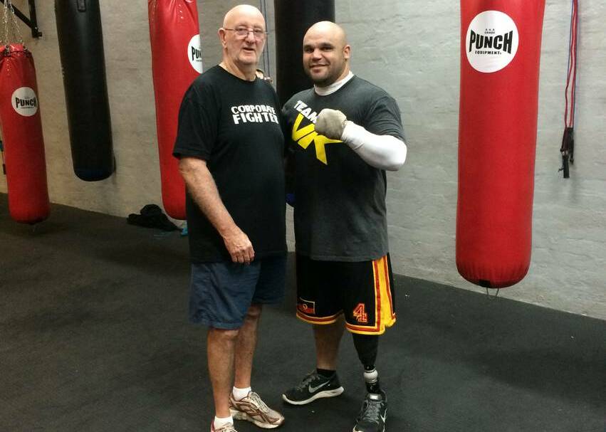SPECIAL MEETING: Legendary trainer Johnny Lewis (left) with amputee boxer Brad Hardman. 