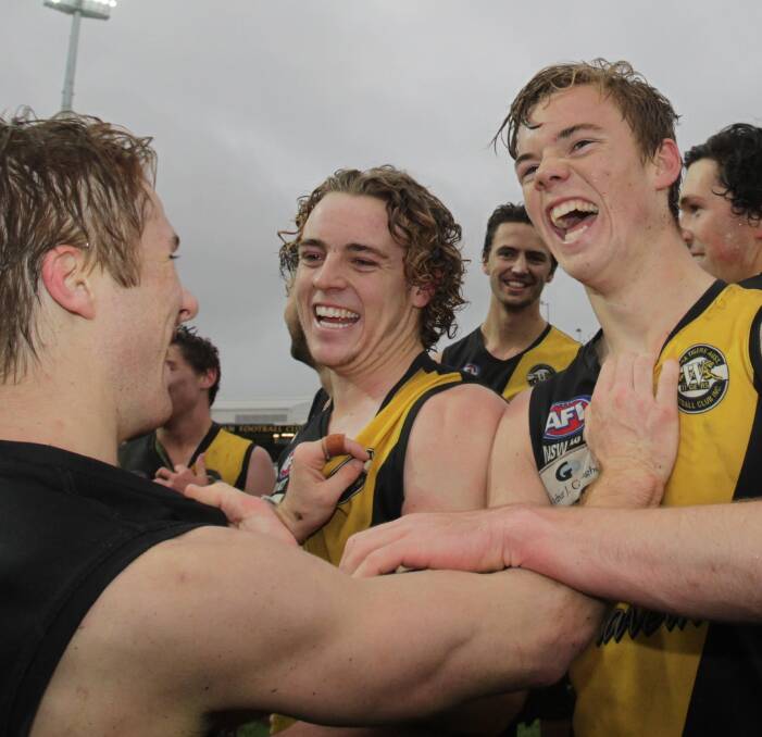 BRIGHT FUTURE: Wagga Tigers teenagers Jake Gaynor, Brendan Myers and Dylan Morton celebrate their grand final victory at Robertson Oval on Sunday. Picture: Les Smith
