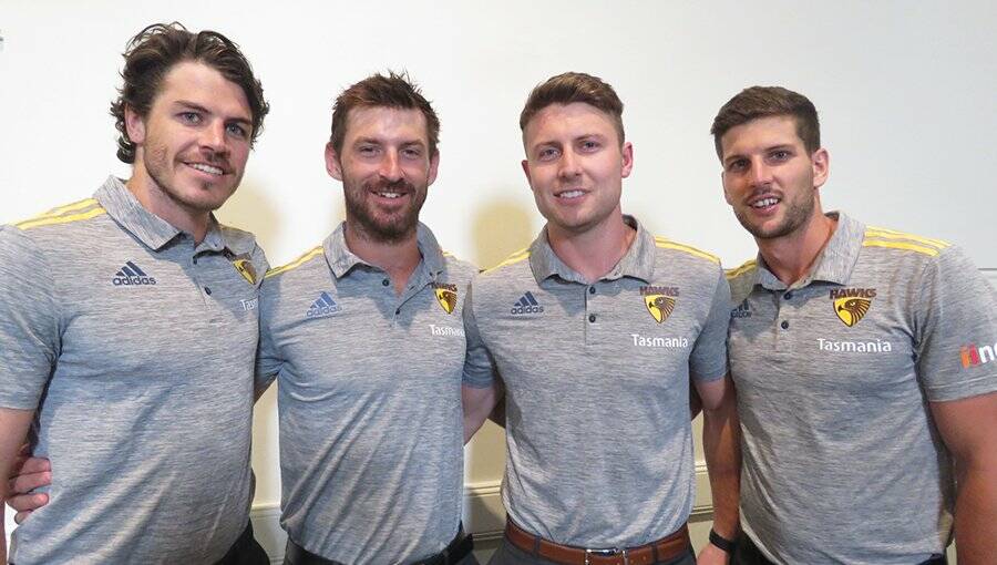 HONOURED: Hawthorn footballers Isaac Smith, Brendan Whitecross, Liam Shiels and Luke Breust received life membership. Picture: Hawthorn FC