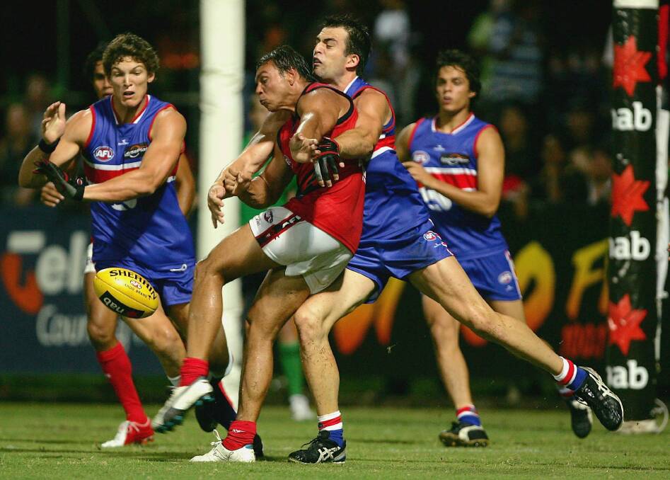 HEADLINE ACT: Shannon Motlop getting a kick for Melbourne against Western Bulldogs back during his AFL career. Motlop will line up for Ganmain-Grong Grong-Matong against Wagga Tigers on Saturday. Picture: Getty Images