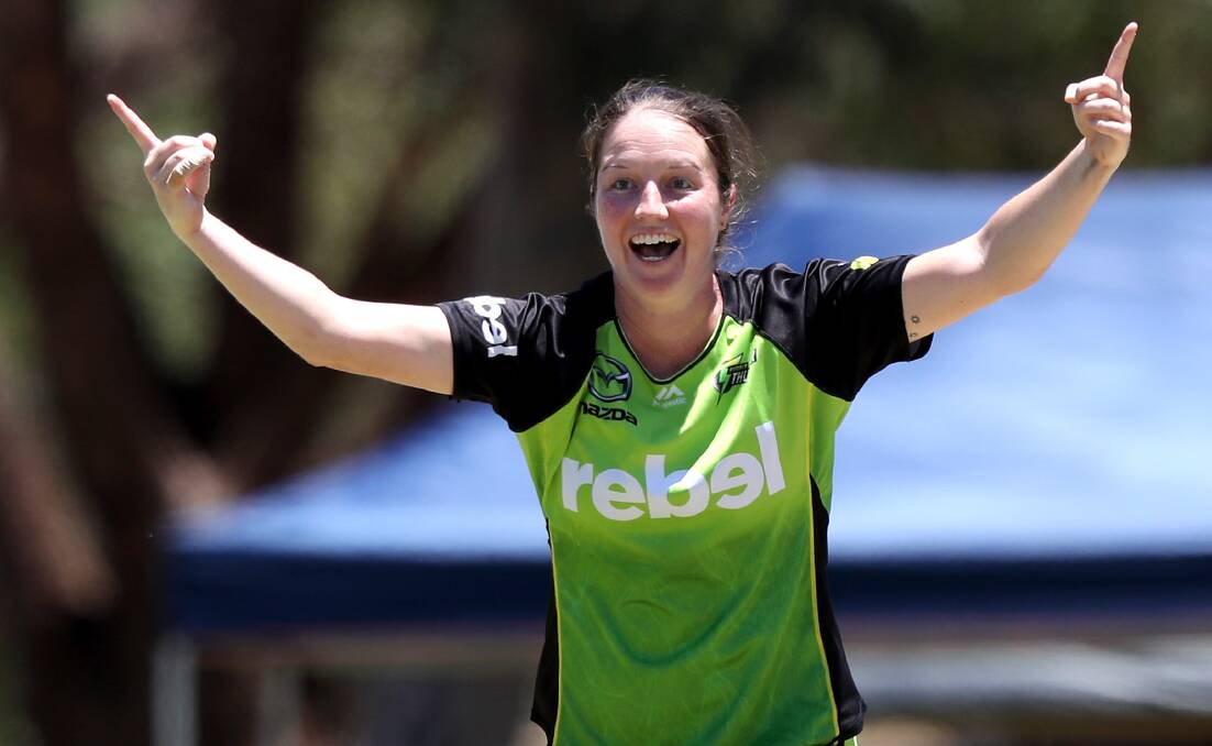 HOWZAT: Sydney Thunder quick Rene Farrell celebrates a wicket against the Perth Scorchers last weekend.