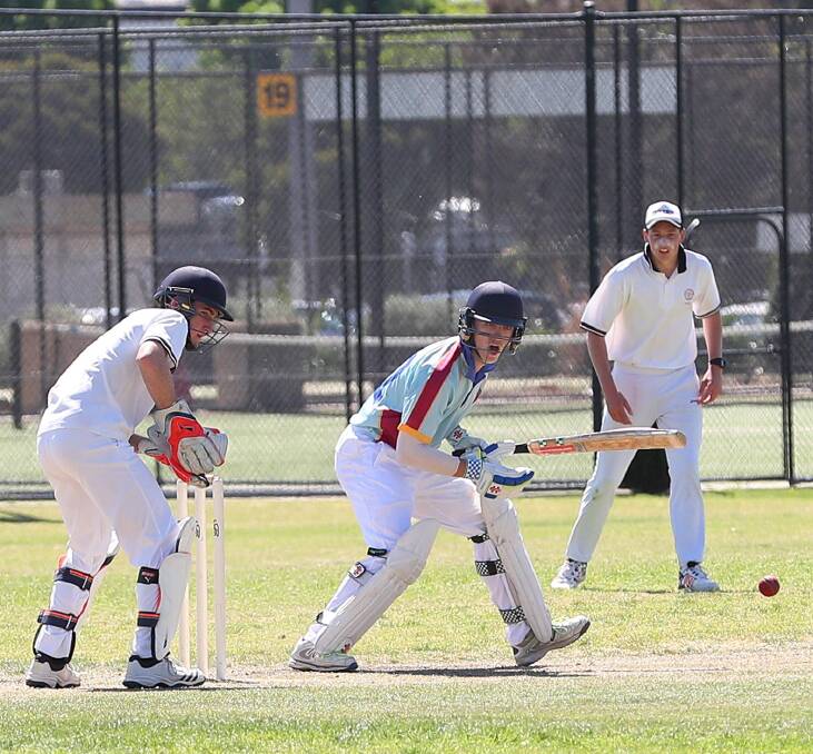 WAIT ON: Mater Dei batsman Harry Rosengren watches the ball head towards point in the Downie Trophy match against Kildare at Bolton Park on Monday. Picture: Kieren L Tilly