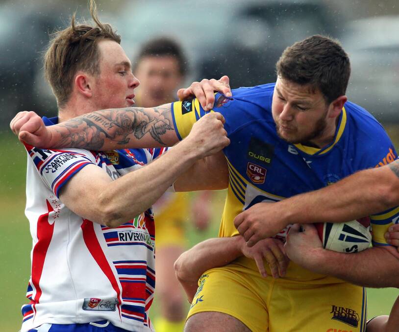 IN DOUBT: Young playmaker Jesse Corcoran (left) in action against Junee. Picture: Les Smith