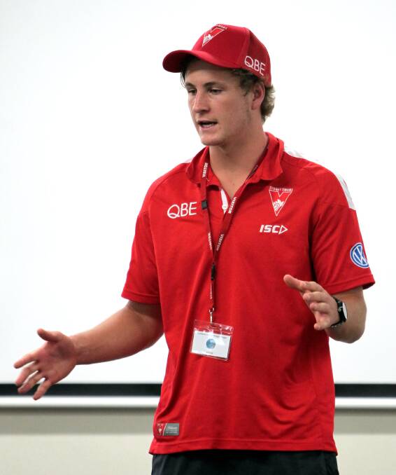 SPECIAL VISIT: New Sydney Swans player Jordan Dawson talks to students at Lutheran Primary School on Monday as part of the AFL Community Camp. Picture: Les Smith