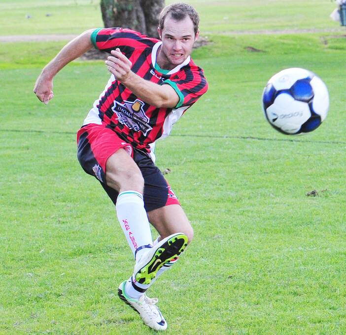 CROSS: Lake Albert's Ashley Jones fires a pass into the box against Henwood Park at Rawlings Park on Sunday. Picture: Kieren L Tilly