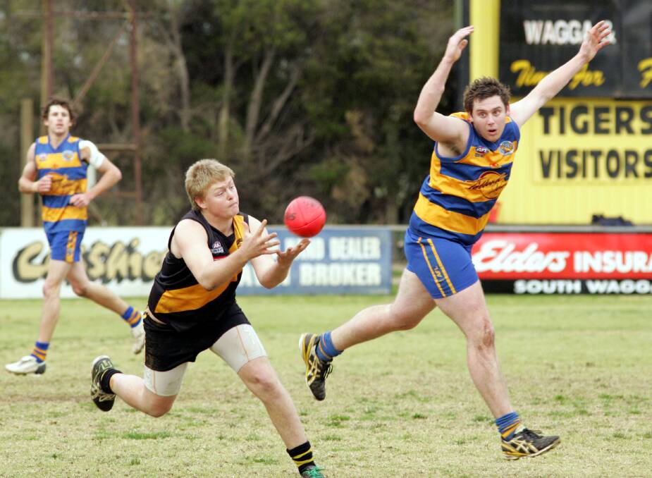 Shannon Terlich takes a mark when playing for Wagga Tigers back in 2009. Picture by Brett Koschel
