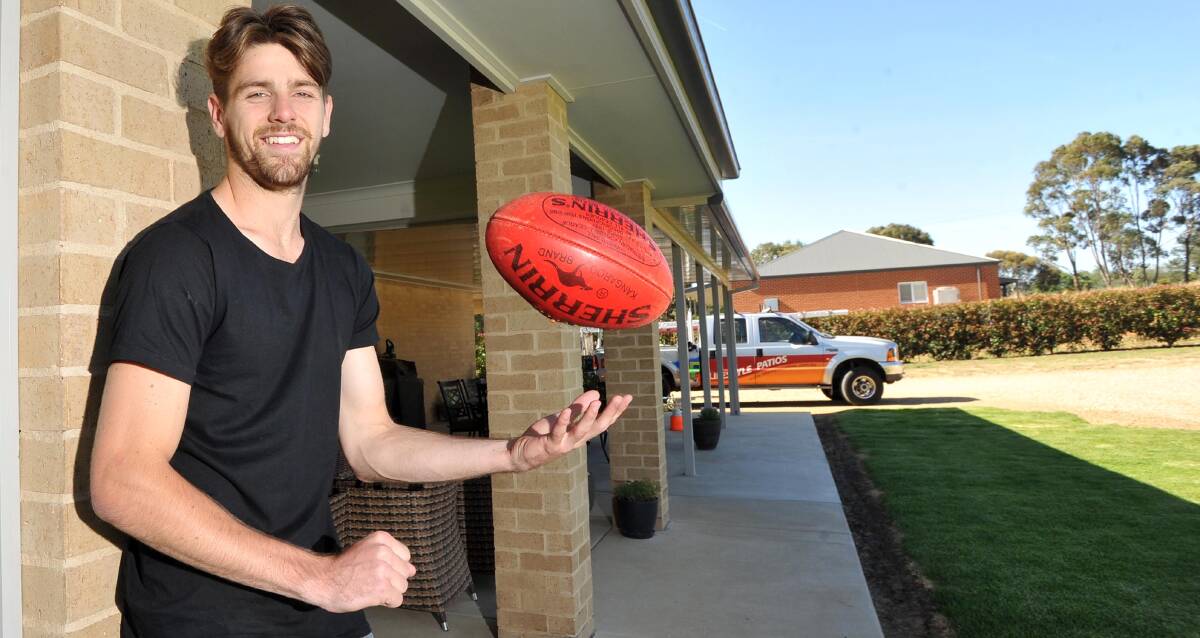 EXCITING TIMES: Jock Cornell is all smiles at home in Wagga on Friday after being picked up by Geelong in the AFL Rookie Draft. Picture: Laura Hardwick