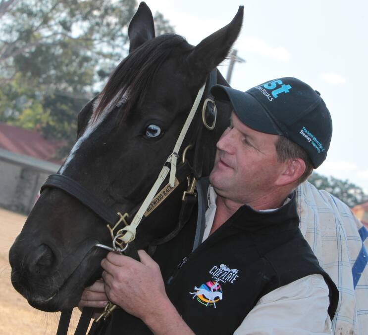 SPECIAL ATTENTION: Wagga trainer Chris Heywood spends some time with Leucura on Wednesday ahead of the Town Plate. Picture: Les Smith
