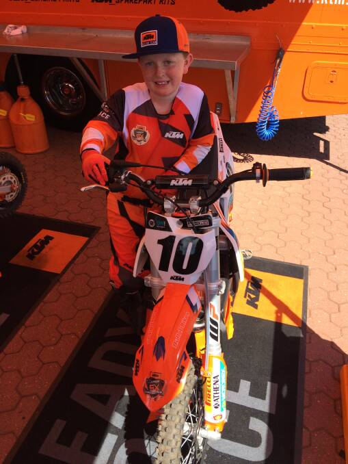 DREAM COME TRUE: Wagga eight-year-old Tommy Joyce shows off the KTM 50 SX he rode at the Aus-X Open in Sydney earlier this month.