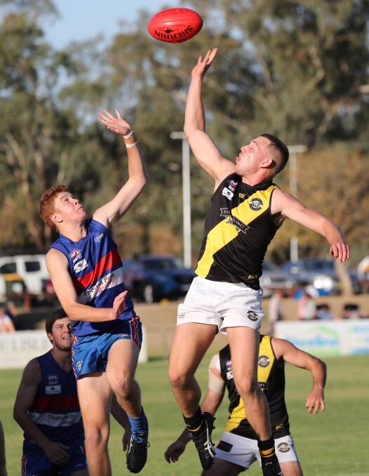 Turvey Park's Jackson Weidemann and Wagga Tigers' Louis Beard compete at Maher Oval last year.