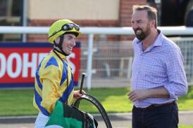 Gundagai's Billy Owen and trainer Nick Olive are all smiles after the win of Just Go Bang at Murrumbidgee Turf Club on Thursday. Picture by Les Smith