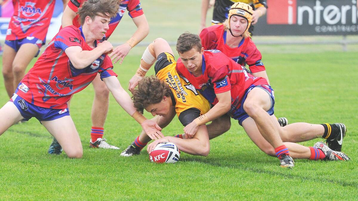 Gundagai's Tate Brooke crosses over for a try in the under 16 game against Kangaroos last season. Picture: Kieren L Tilly