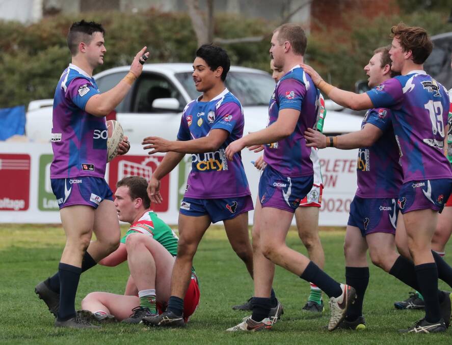 HAPPY DAYS: Southcity celebrate one of their many tries against Brothers in the Group Nine game at Harris Park on Saturday. Picture: Les Smith
